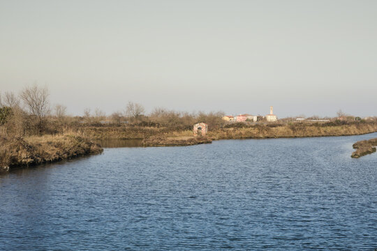 View of the small town of Lio Piccolo among the salt marshes in the Venetian lagoon