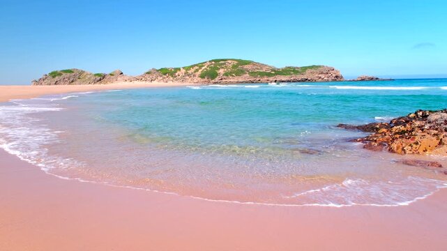 Breathtaking beach and clear blue ocean at The Island of Robberg Nature Reserve