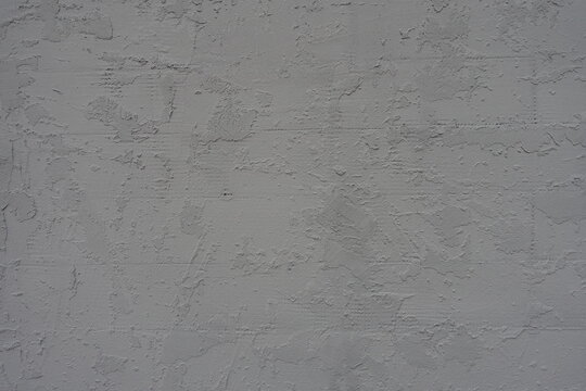 Texture of gray wall with troweled dash stucco finish