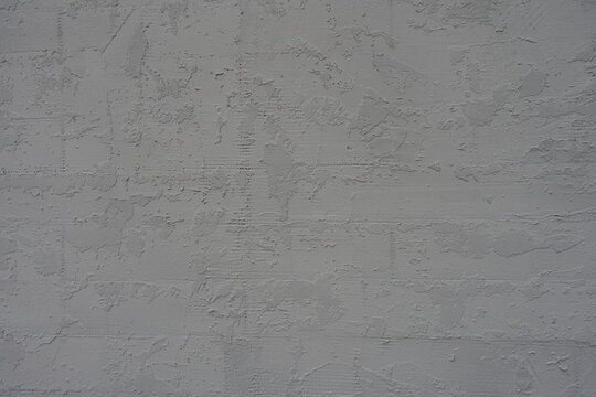 Texture of gray wall with troweled dash stucco finish