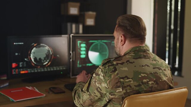 Ukrainian military analyzing satellite data in command center for mission