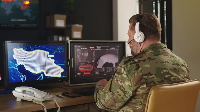 U.S. army officer supervising missile launch toward Iran in control room