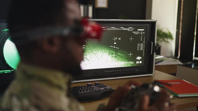 Experienced FPV drone pilot in headset improving flight skills on simulator