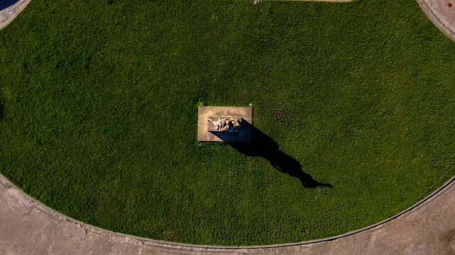 Top-down aerial view of the Centaur monument at Waly Chrobrego square.