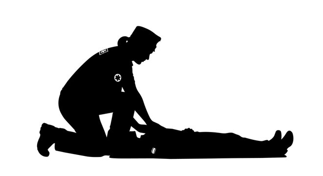Paramedic performing CPR on a patient, isolated on transparent background