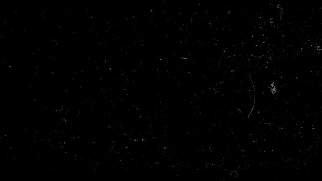Analog film damage overlay with realistic dust and scratch details.