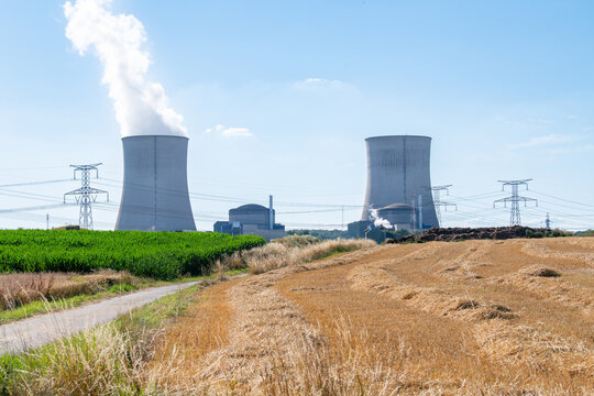 Cattenom nuclear power plant in France, steaming cooling towers, air pollution, environment and energy industry