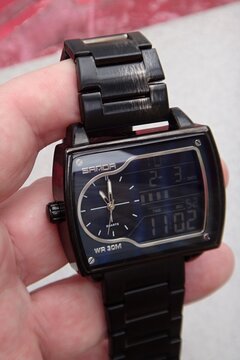 Sanda black dual display quartz wristwatch showing time
