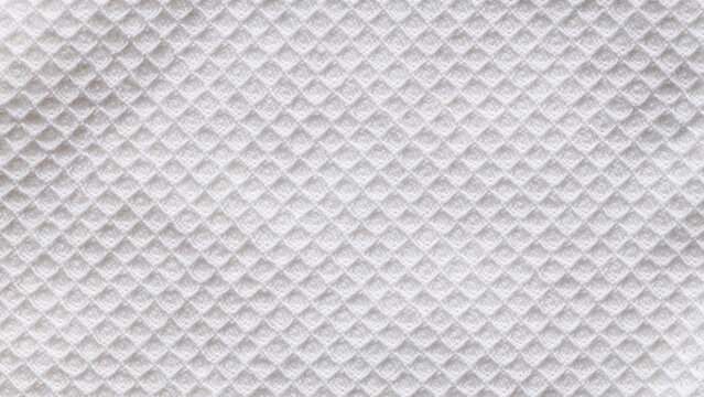 White waffle cotton fabric texture background with diamond pattern for clean soft textile backdrop