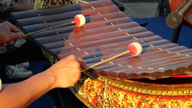Playing Thai xylophone