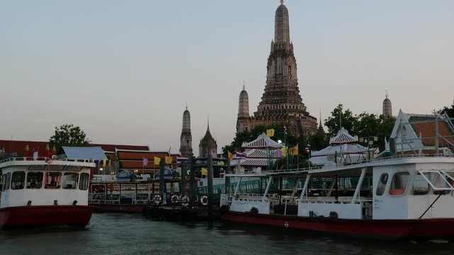 Wat Arun, also known as the Temple of the Dawn, is one of the most renowned temples in Bangkok. It is located next to the Chao Phraya River. Many tourists get their by commuter ferry. 