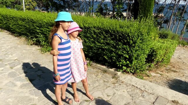 Two little beautiful girls in Nesebar, Bulgaria