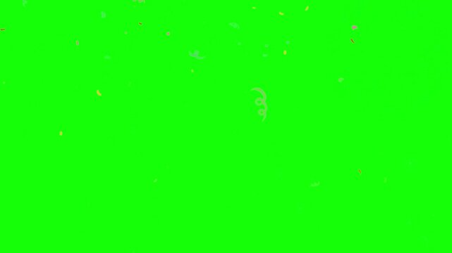 A vibrant video showcasing colorful particles exploding on a bright green background
