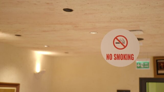 Sign shows no smoking rule in indoor space