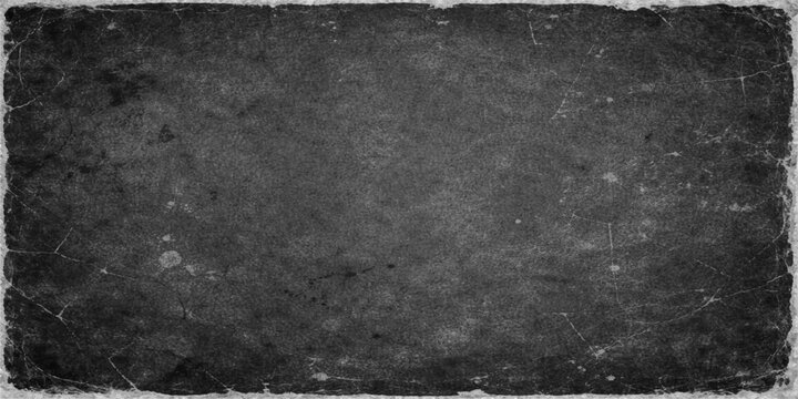 Aged black and white grunge paper texture with a dark rough concrete wall pattern and vintage grey stone surface material backdrop