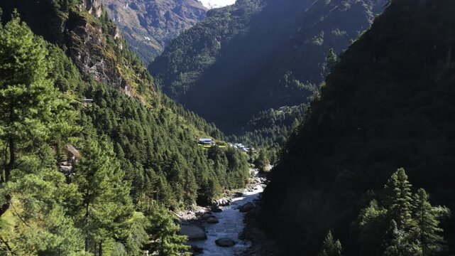 River Flowing Through a Lush Himalayan Mountain Valley, Nepal