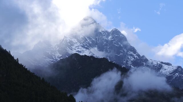 Sharp Himalayan Mountain Peak Shrouded in Thick Clouds, Nepal