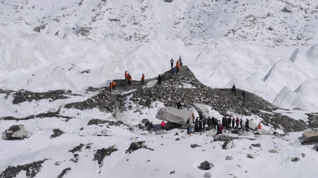 Trekkers at the Famous Everest Base Camp Stone Landmark, Nepal
