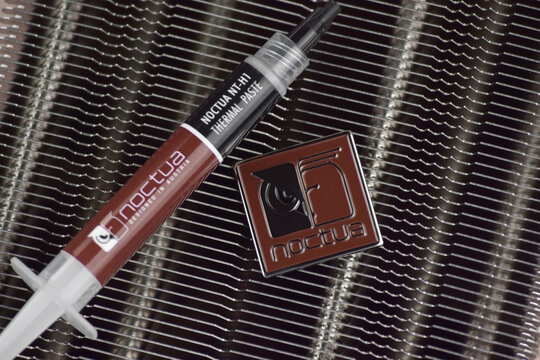 Noctua CPU thermal paste on a light background.