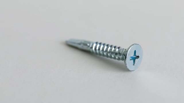 Self Drilling Phillips Countersunk Screws on White Background Close Up