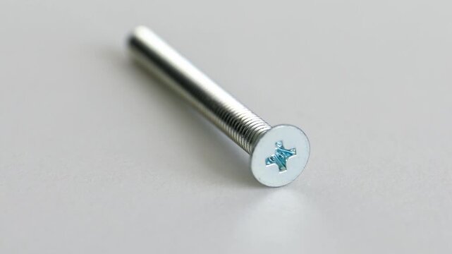 Flat Head Phillips Machine Screws on White Background Close Up