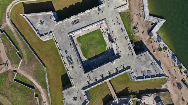 Castillo de San Marcos showcasing its star-shaped design and surrounding grounds. Ideal for history documentaries or educational content.