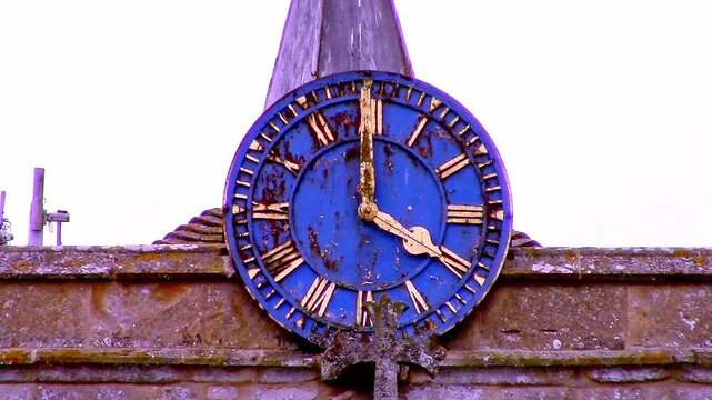 A very unusual clock added to a 12th century medieval church