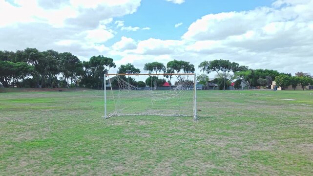 A soccer goals on a soccer field at a soccer club.