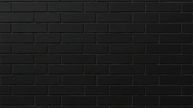 Dark black brick wall with rectangular bricks and mortar creating a textured background with shadows