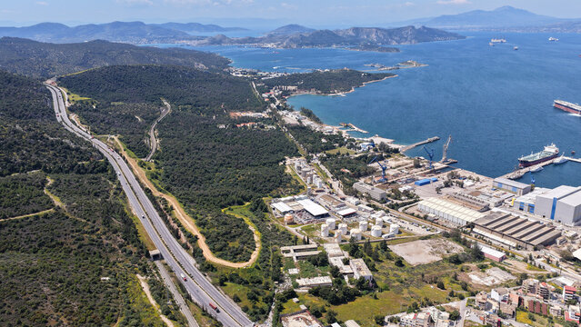 Aerial drone photo of port town and recently renovated ship yard of Skaramagas in Western area of Attica, Elefsina bay, Attica, Greece