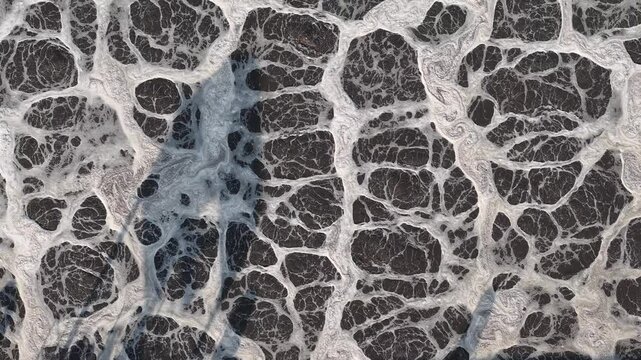 Aerial drone view of wastewater treatment aeration basins