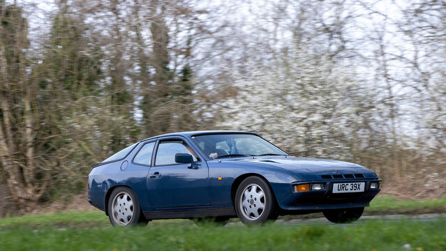 Milton Keynes,Bucks,UK - Mar 1st 2026:  1981 blue Porsche 924 turbo classic car driving on a British road