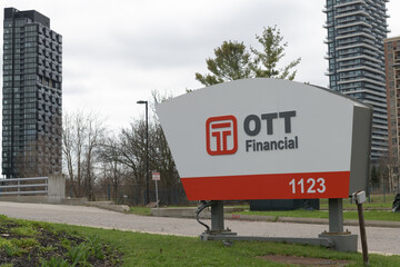 Naklejka premium roadside pylon sign outside OTT financial headquarters at 1123 Leslie St; a hub for fintech and wealth management in Toronto, April 2026