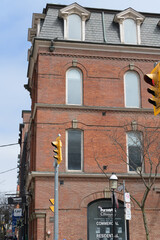 Obraz premium historic building facade (Little York Hotel) location of Remax, a real estate agency, located at 187 King St E, Toronto