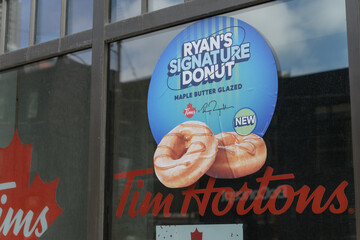 Obraz premium window sign at Tim Hortons for Ryan's Signature Donut, Toronto