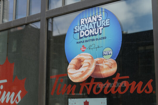 window sign at Tim Hortons for Ryan's Signature Donut, Toronto