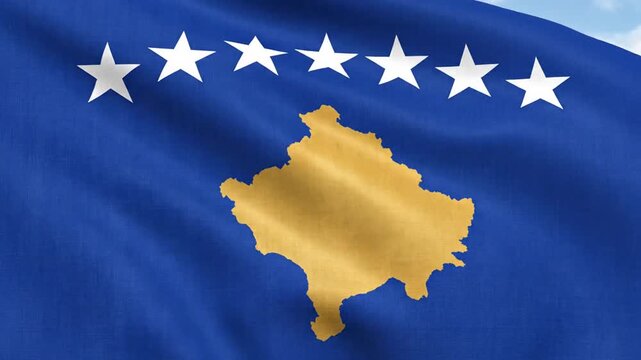 National flag of Kosovo waving with detailed fabric texture and golden map symbol
