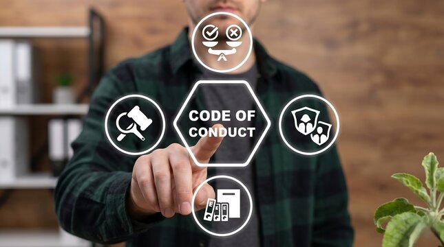 Man using virtual touch screen presses inscription: CODE OF CONDUCT. Concept of code of conduct. Employee work ethics. code, business, conduct, concept