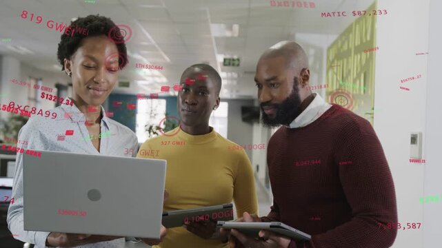 Tech team demoing laptop, woman initiating red green HUD around devices, reviewing KPIs and smiling