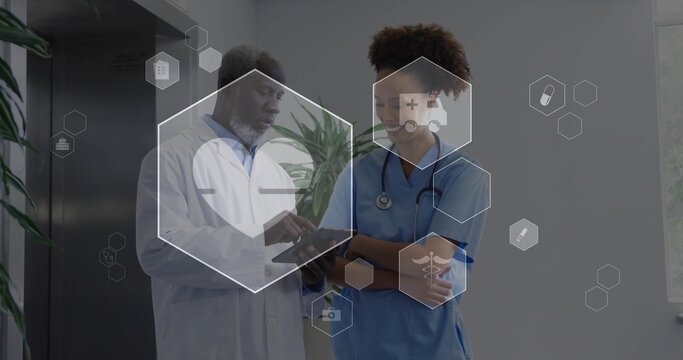Doctor in white coat pointing tablet while nurse in blue scrubs stethoscope listening, hex overlay