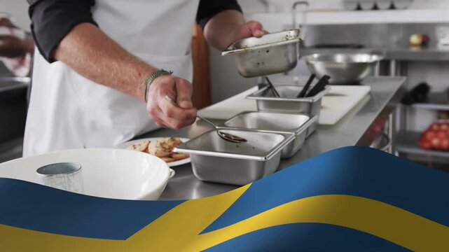 Flag graphic lifting to reveal kitchen, chef scooping sauce with spoon into three pans for service