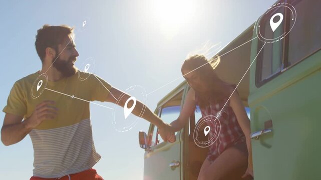 Man stepping from green van helping woman down, animated pins mapping trip to shore