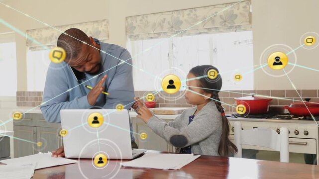 Father juggling phone call managing work in kitchen, daughter pointing, yellow icons connecting