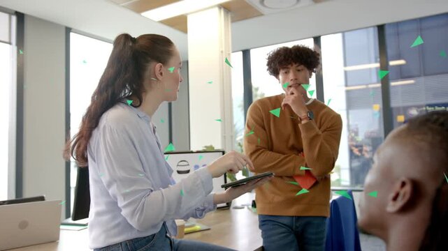 Woman tapping tablet and explaining sales data, initiating bar chart and green triangle overlays