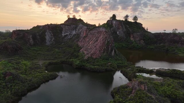 Aerial drone footage of Frog Hill and surrounding lakes at Kubang Semang during sunrise.