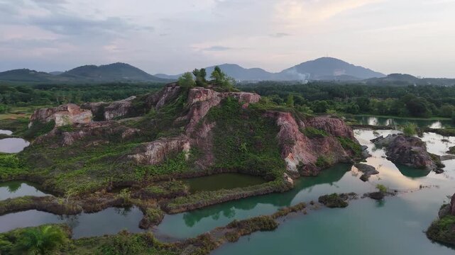 Aerial drone view of Frog Hill at Kubang Semang showing quarry lakes and surrounding vegetation.