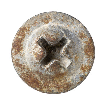 Weathered metal screw head with cross drive. Rusty surface tells a story of time and use. Clean white backdrop