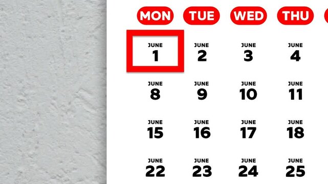 The date June 1st marked with a red cursor on the wall calendar 2026