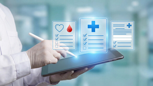 A doctor reviews electronic medical records on a tablet device.