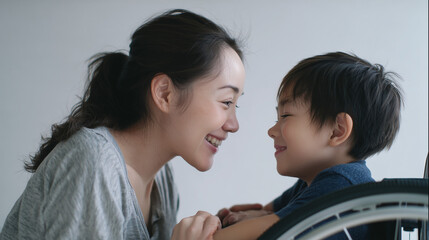 Obraz premium Close-up of mother and young child smiling face to face, emotional bond, love and parenting concept.